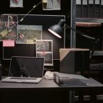 Evidence board with case files or investigation clues